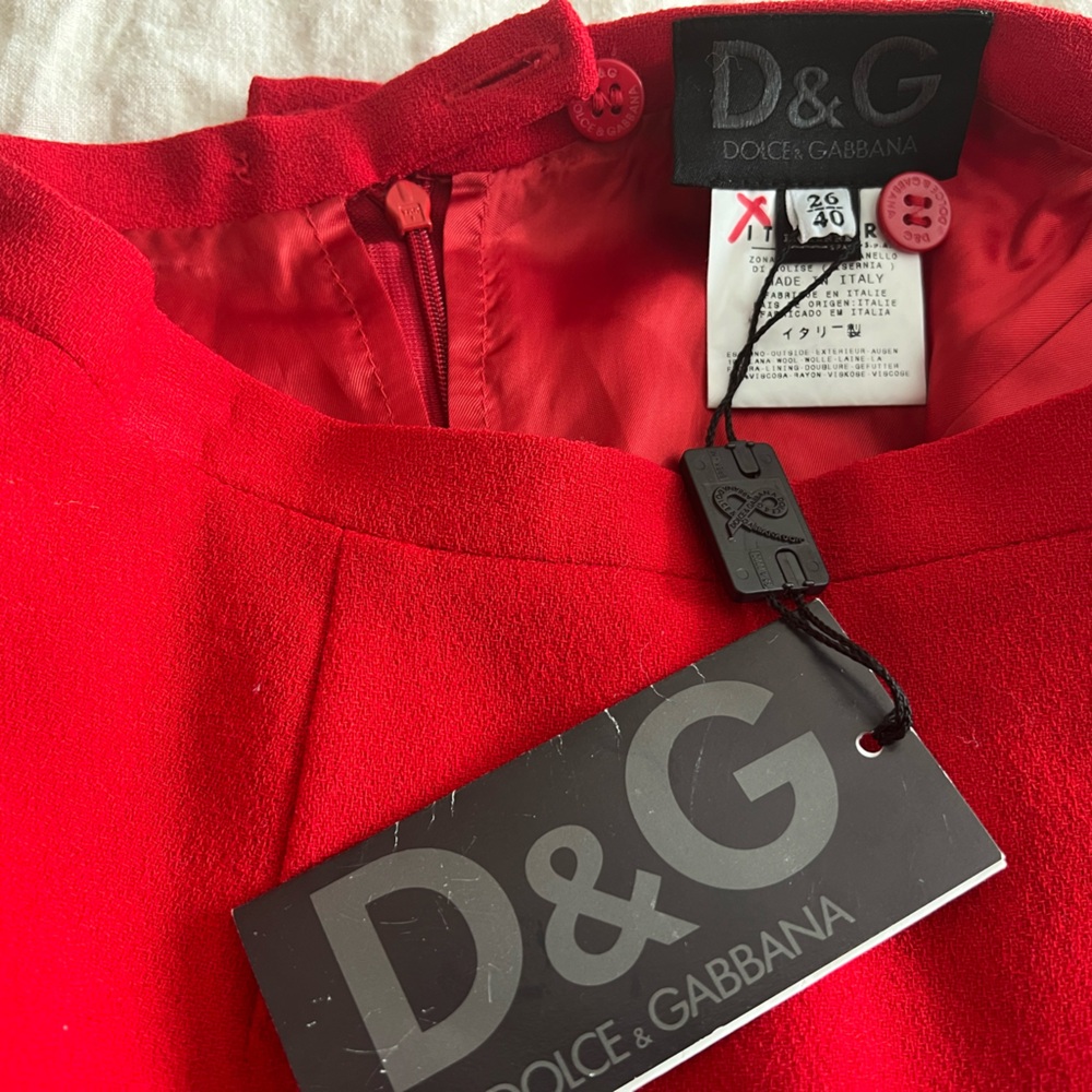 Dolce & Gabbana red mini skirt. New with tags. Size 26